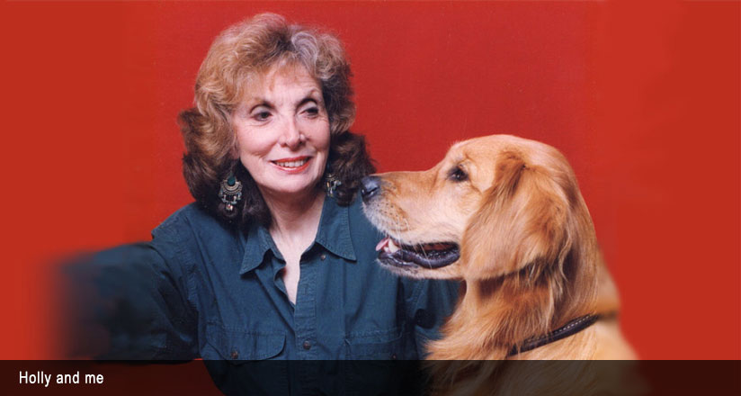 Marian Silverman posing her dog Holly.